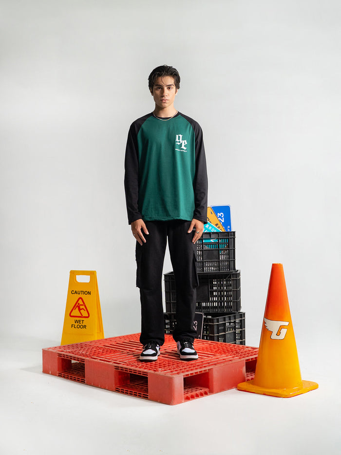 Cold Blooded Green dark green black raglan tee male model full body front view Pakistan – GROOVY