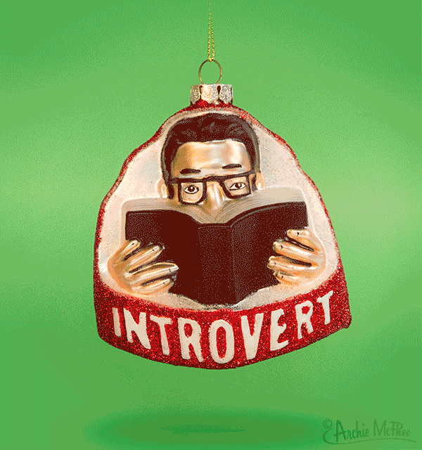 This hand-blown Introvert Ornament is a beautiful glass Christmas decoration showcasing a person reading a book against a lush green background, making it the perfect holiday adornment for book lovers and those who appreciate serene moments.
