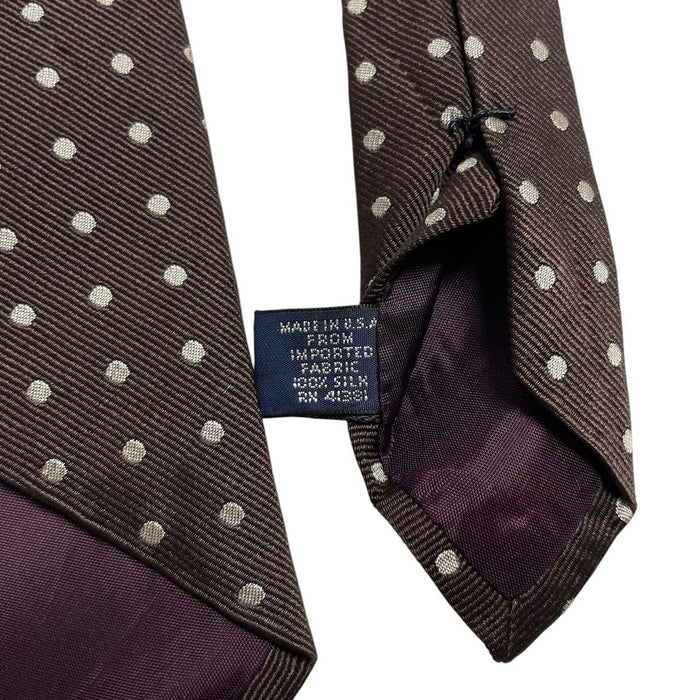 Polo Ralph Lauren beige and brown polka dot silk tie with classic logo detail.