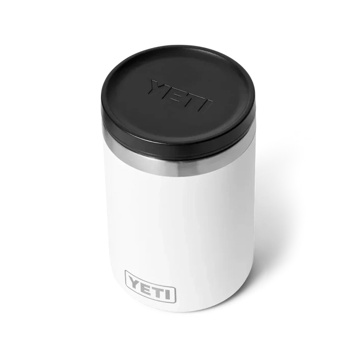Yeti white insulated tumbler with black lid, ideal for watersports adventures