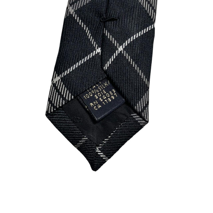 Banana Republic silk tie black and white check pattern with a smooth finish.