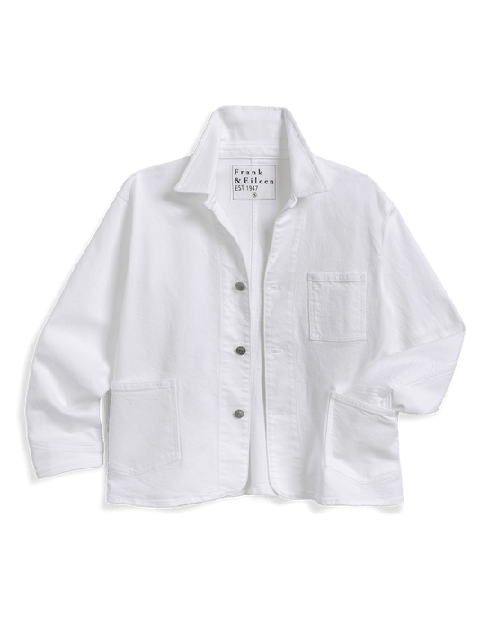 A white long-sleeve button-up shirt jacket by Frank & Eileen, featuring a pointed collar, a chest pocket, and two large front patch pockets, laid flat on a white background.