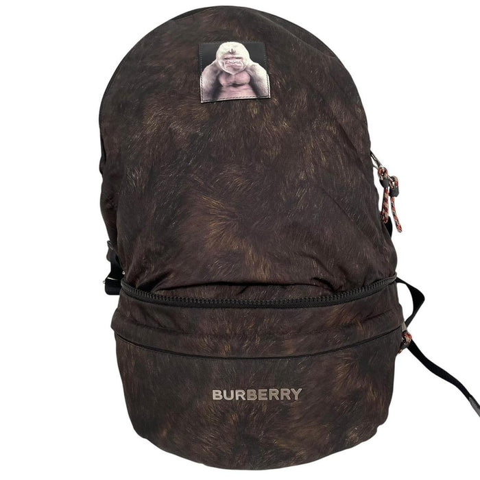 Burberry brown and black convertible bum bag with ape logo and durable material.