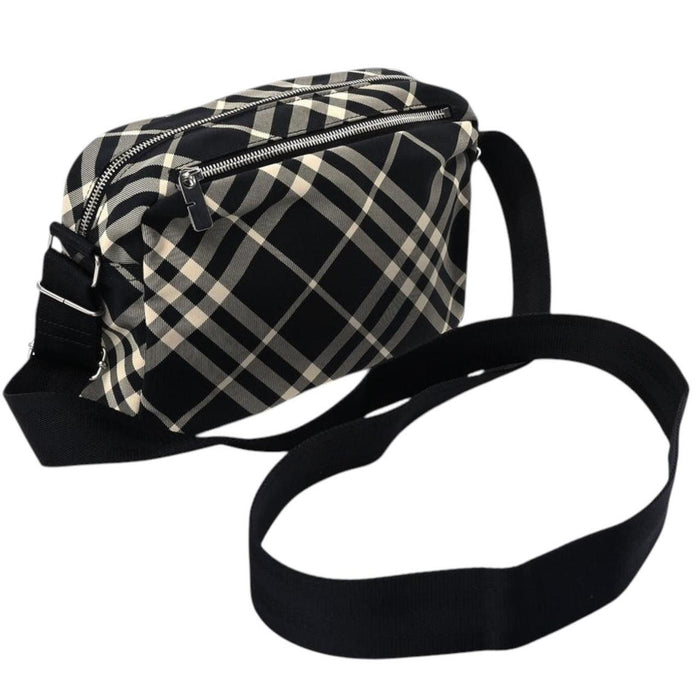 Burberry black and white EKD check canvas duffel bag with logo detail.