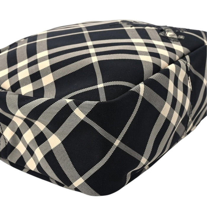 Burberry black and white EKD check canvas duffel bag with logo detail.