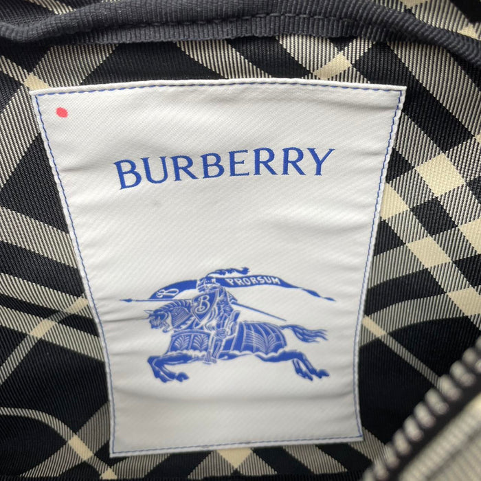 Burberry black and white EKD check canvas duffel bag with logo detail.