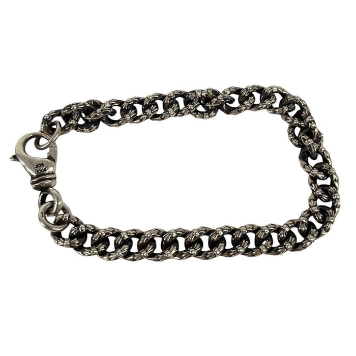 Chrome Hearts silver bracelet with intricate link design and logo detailing.