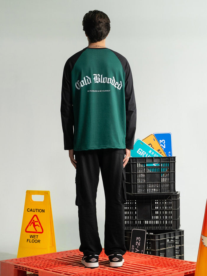 Cold Blooded Green raglan tee male model back view green black contrast sleeve Pakistan – GROOVY