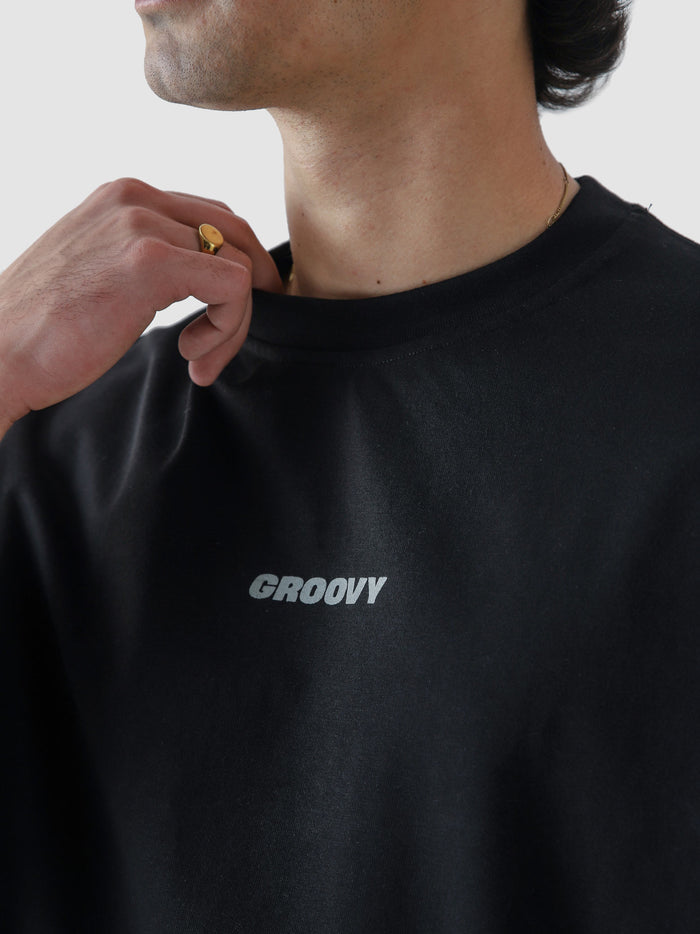 Black CORE tee female model front view oversized blank t-shirt Pakistan – GROOVY