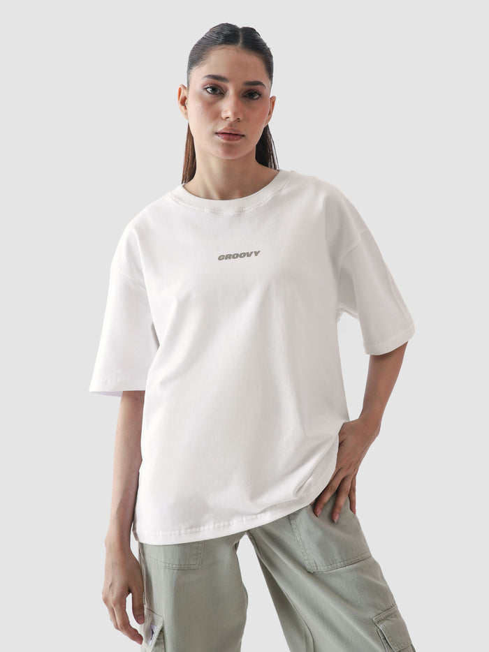 White oversized blank t-shirt male model full body front view Pakistan – GROOVY CORE Tees