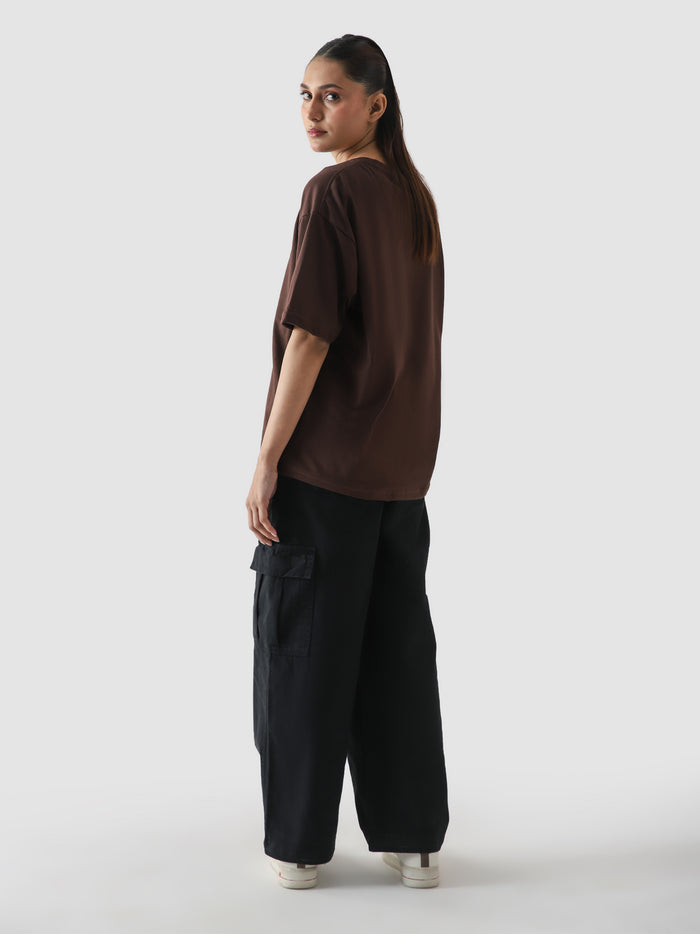 Mocha brown CORE tee male model outdoor lifestyle shot Pakistan – GROOVY