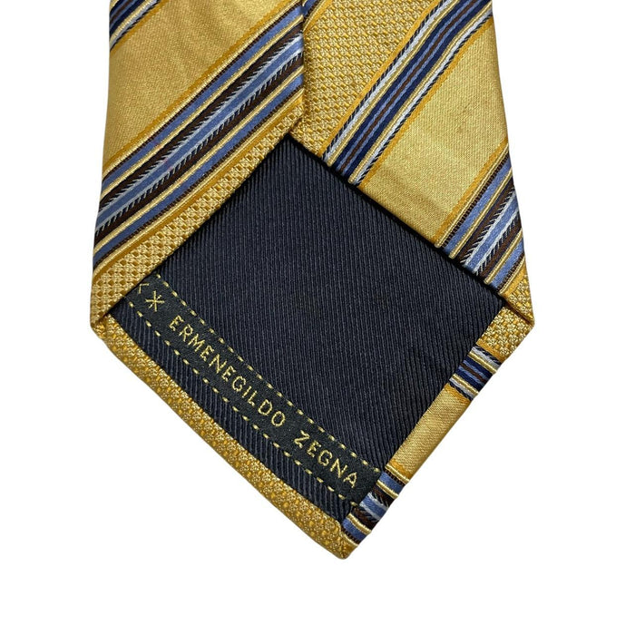 Ermenegildo Zegna yellow silk tie with diagonal stripes and subtle sheen.