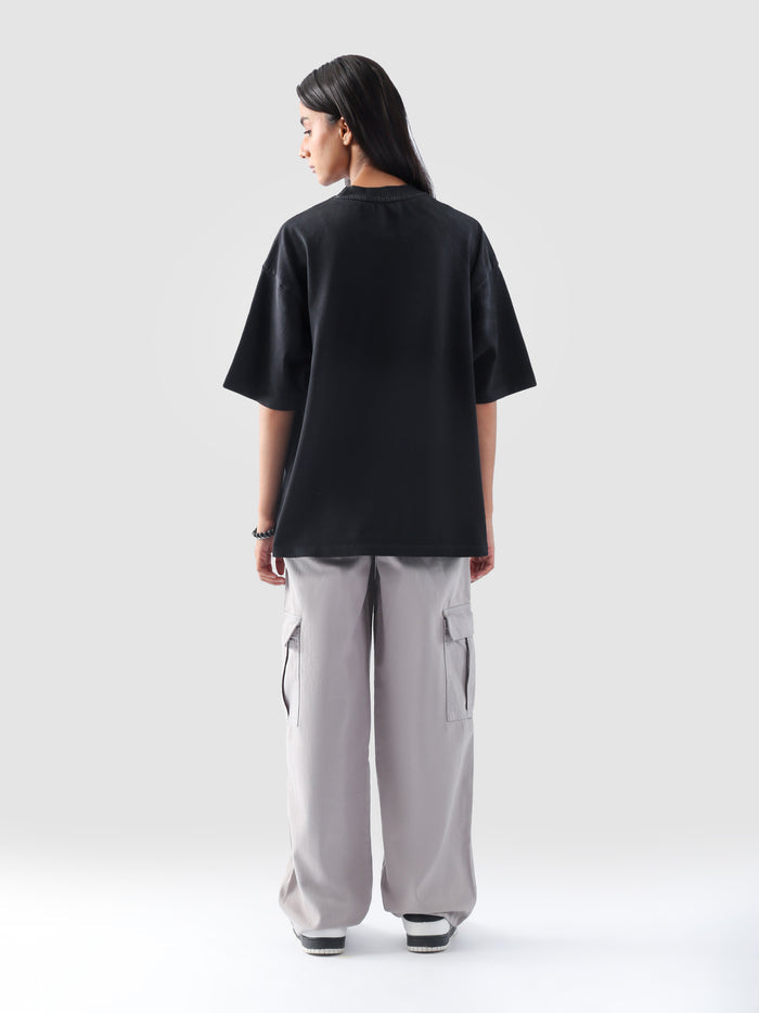 Fade washed t-shirt female model front view oversized unisex streetwear Pakistan – GROOVY