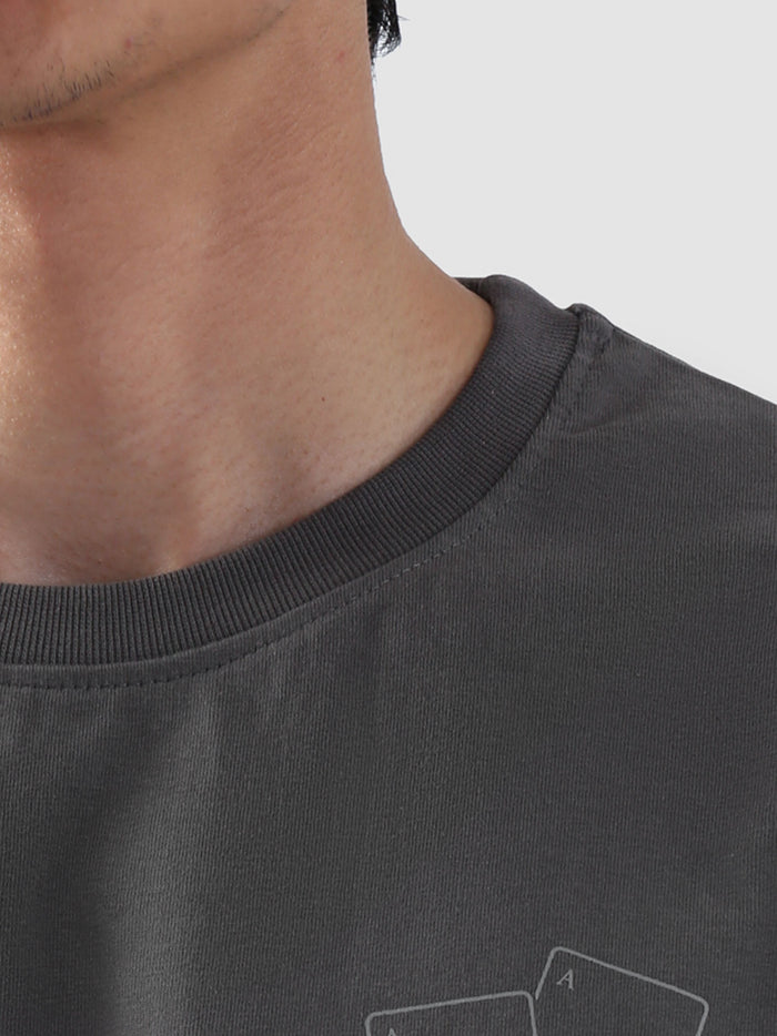 Close-up of ribbed neckline on stone grey oversized t-shirt from Groovy Pakistan – premium stitching detail and relaxed collar design