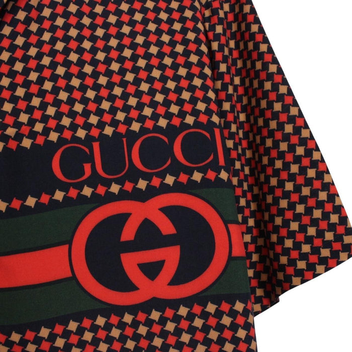 Gucci silk short sleeve bowling shirt in red and navy blue houndstooth pattern.