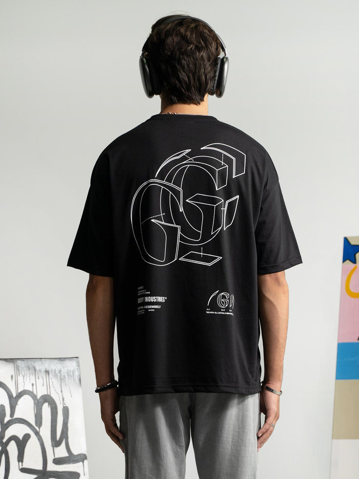 Initial Assembly tee couple lifestyle shot black graphic streetwear Pakistan – GROOVY