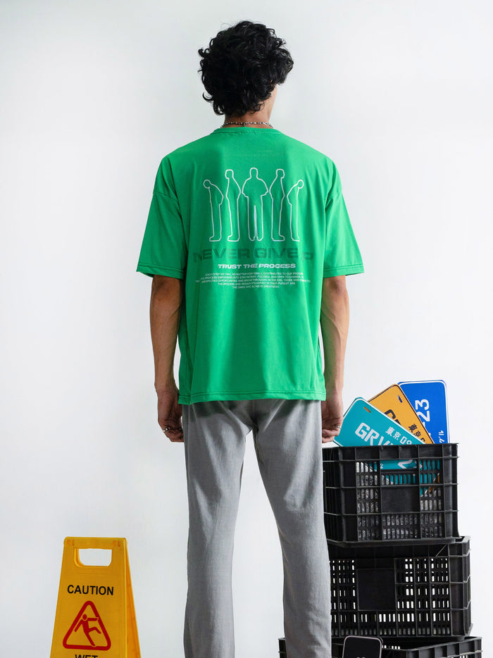Emerald Green Graphic T-Shirt Flat Lay – Never Give Up – GROOVY Pakistan
