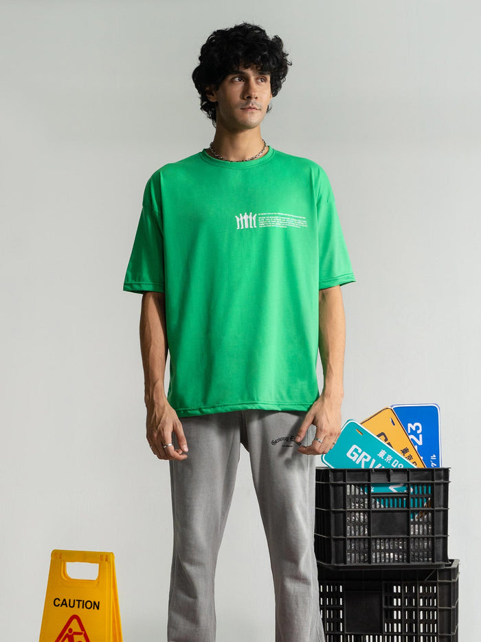 Emerald Green Tee Male Model Full Body Front – Never Give Up – GROOVY Pakistan