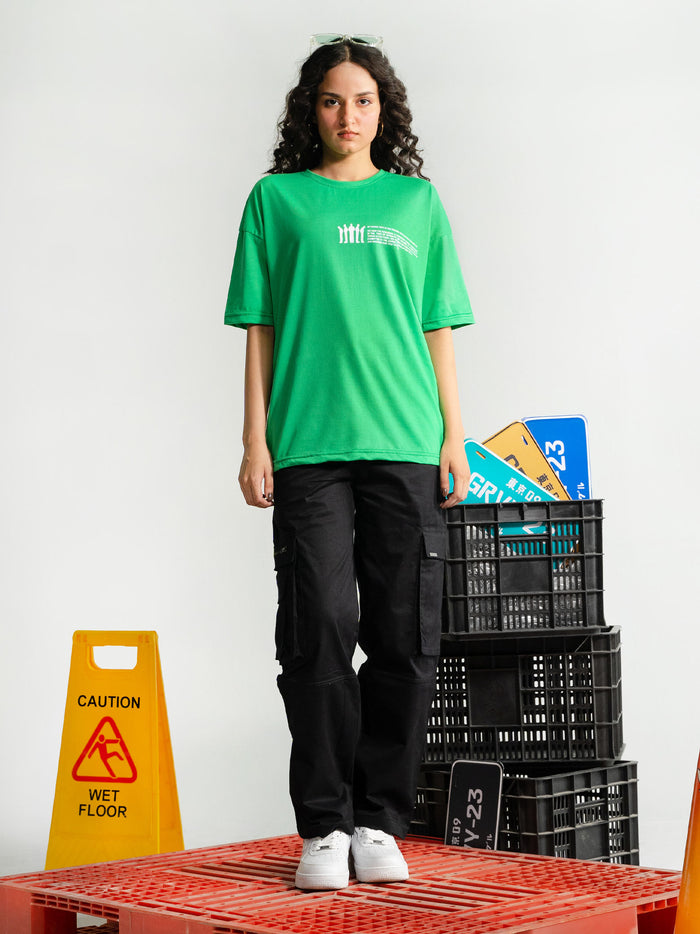 Emerald Green Tee Flat Lay – Never Give Up – GROOVY Pakistan
