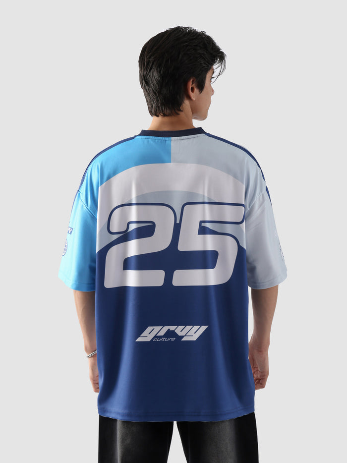 Back view of oversized racing jersey with number 25 and Groovy Culture branding – blue and white unisex streetwear top in Pakistan