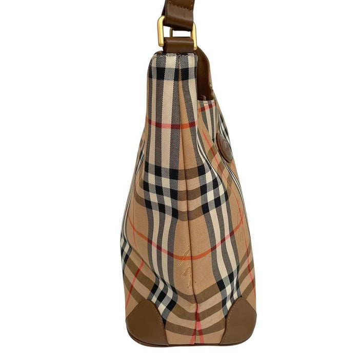 Burberry tan brown duffel bag featuring iconic Nova Check pattern and leather accents.