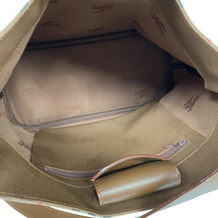 Burberry tan brown duffel bag featuring iconic Nova Check pattern and leather accents.