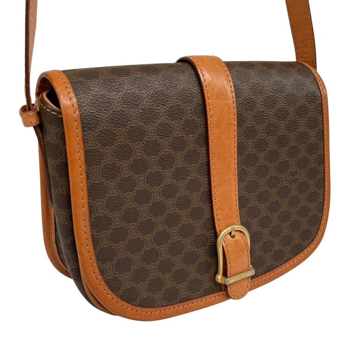 CELINE brown and tan duffel bag with Macadam pattern and leather/canvas material.