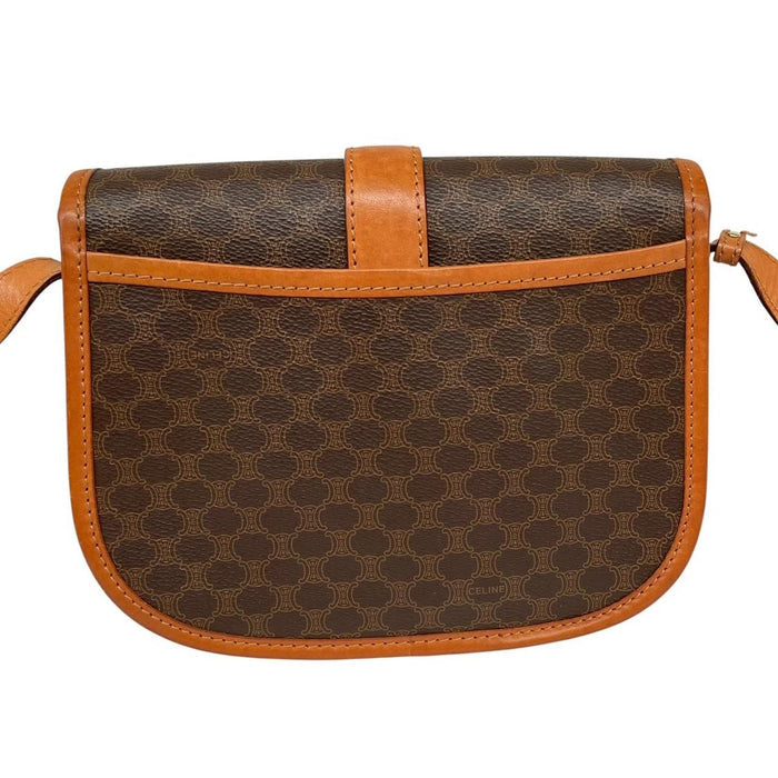 CELINE brown and tan duffel bag with Macadam pattern and leather/canvas material.