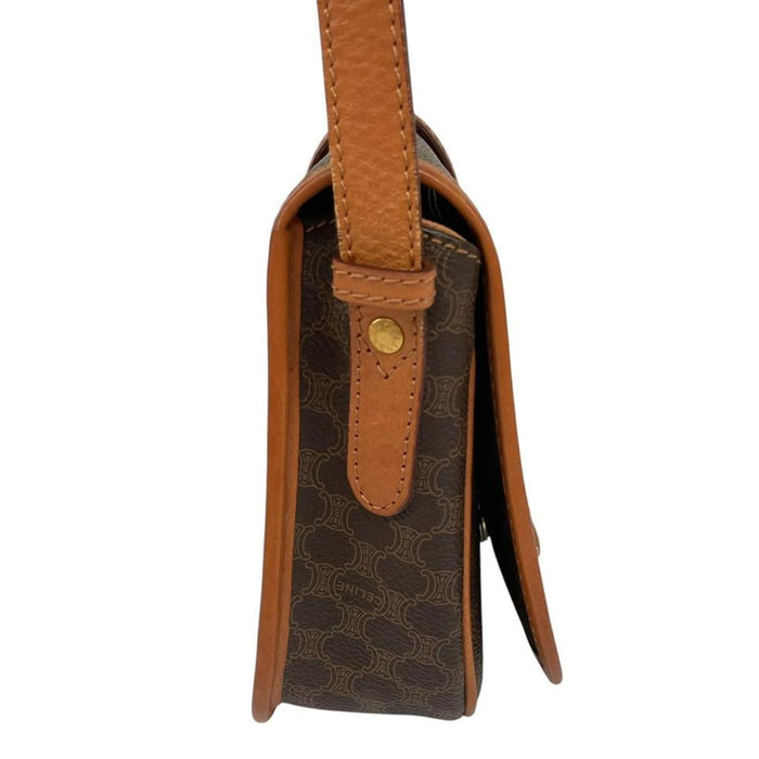 CELINE brown and tan duffel bag with Macadam pattern and leather/canvas material.