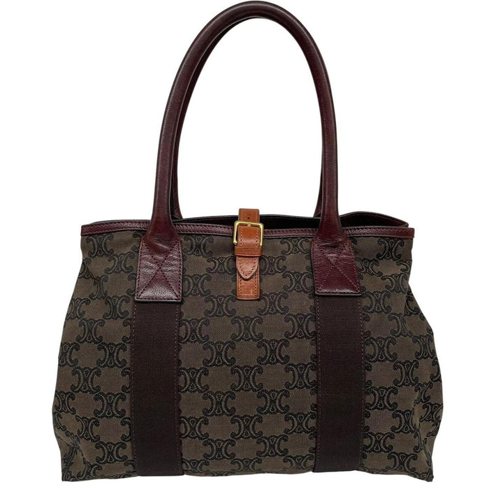 CELINE brown duffel bag with Macadam Triomphe pattern and canvas material.