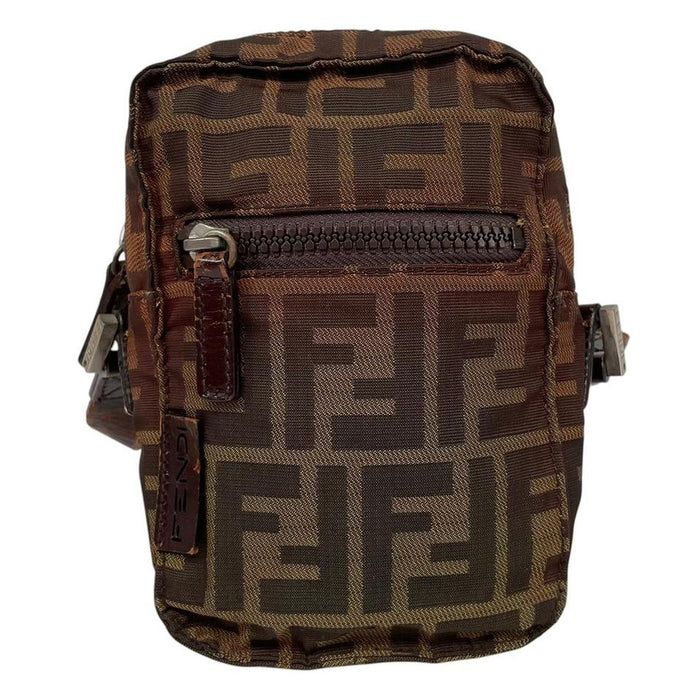 Fendi brown duffel bag with monogram canvas, visible wear and cracking on strap.