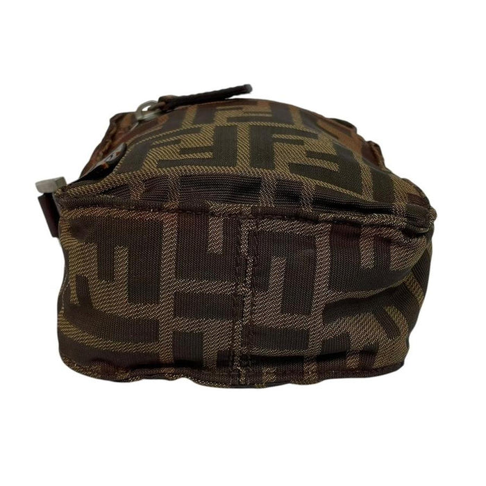 Fendi brown duffel bag with monogram canvas, visible wear and cracking on strap.