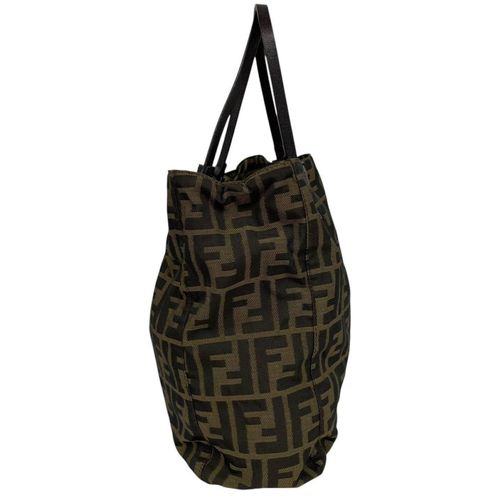Fendi brown duffel bag featuring iconic Zucca monogram canvas and leather handles.