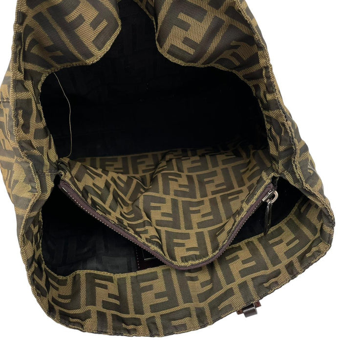 Fendi brown duffel bag featuring iconic Zucca monogram canvas and leather handles.