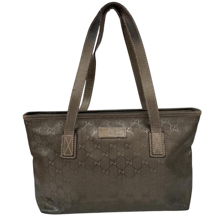 Gucci khaki green duffel bag with metallic monogram canvas and leather trim details.