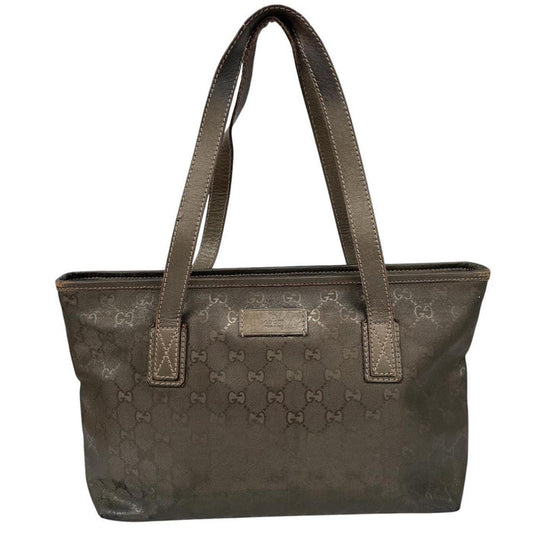 Gucci khaki green duffel bag with metallic monogram canvas and leather trim details.