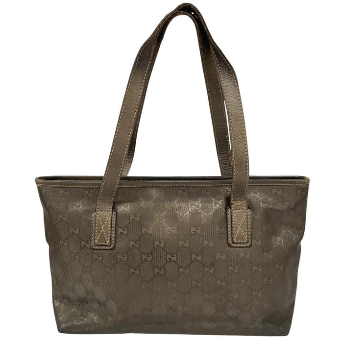 Gucci khaki green duffel bag with metallic monogram canvas and leather trim details.