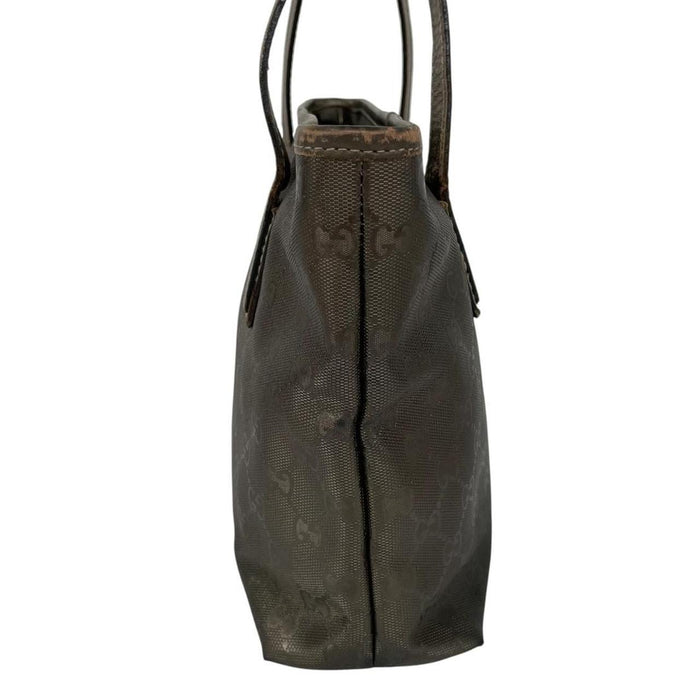 Gucci khaki green duffel bag with metallic monogram canvas and leather trim details.