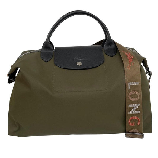 Longchamp green Le Pliage Enery tote bag with logo and durable nylon material.