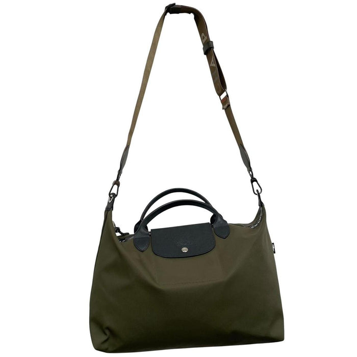 Longchamp green Le Pliage Enery tote bag with logo and durable nylon material.