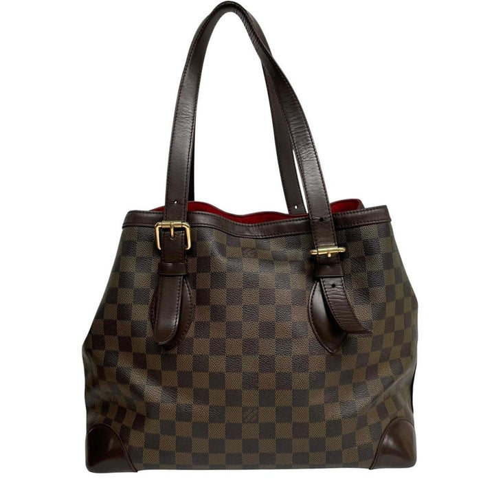 Louis Vuitton brown duffel bag with Damier Ebene pattern and logo plaque details.