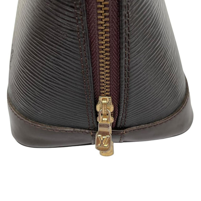 Louis Vuitton black Epi leather duffel bag with iconic logo and structured design.