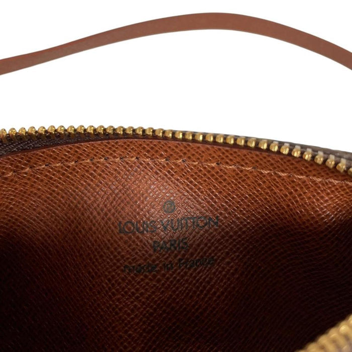 Louis Vuitton brown and tan duffel bag with monogram canvas and logo details.
