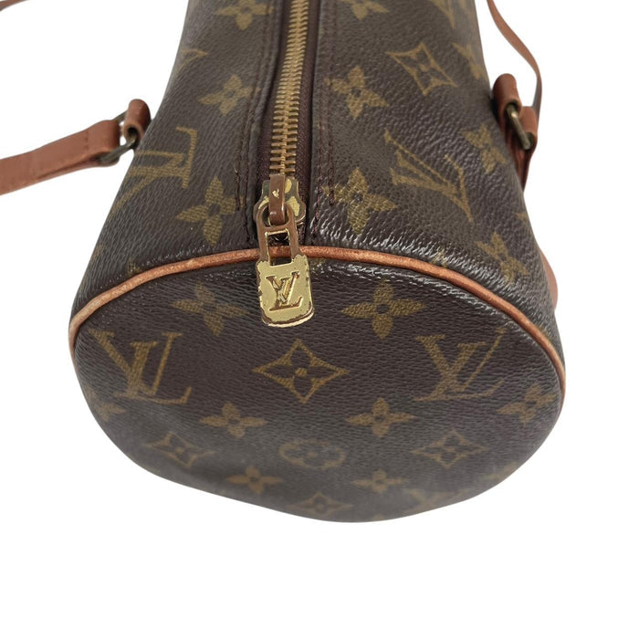 Louis Vuitton duffel bag brown and tan monogram canvas with logo pattern and wear.