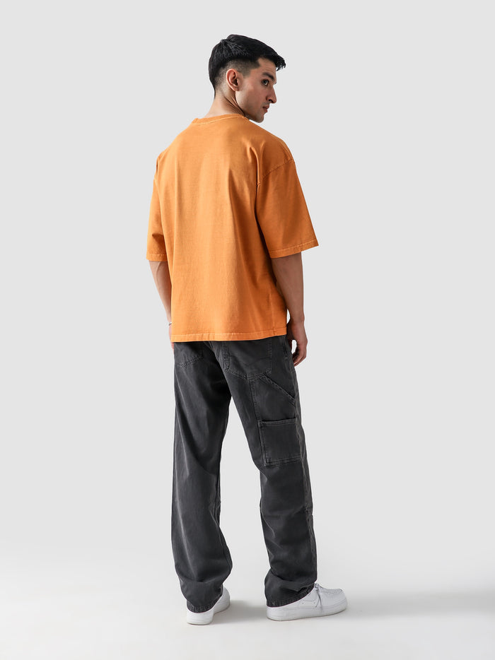 Rust Orange Washed Blank Tee Female Model Front View – GROOVY Pakistan