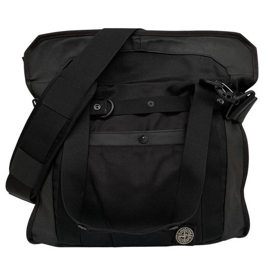 Stone Island black nylon tote bag with logo patch and crossbody strap.