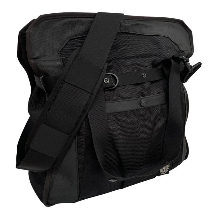 Stone Island black nylon tote bag with logo patch and crossbody strap.
