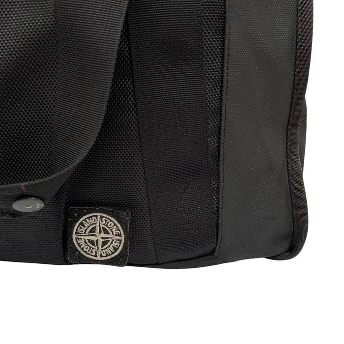 Stone Island black nylon tote bag with logo patch and crossbody strap.
