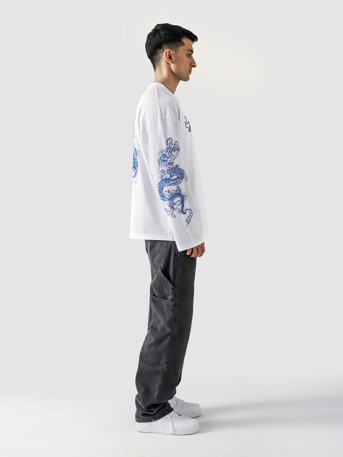 Tanjiro full sleeves tee couple lifestyle shot anime streetwear Pakistan – GROOVY