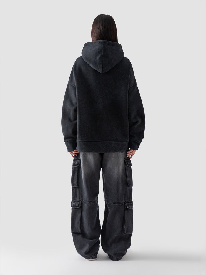 Washed black hoodie male model outdoor lifestyle Pakistan – GROOVY